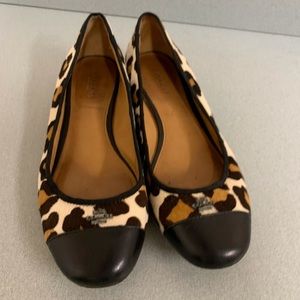 Coach Flats.                                 D1.18